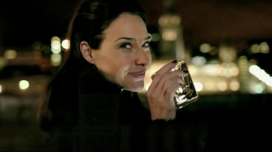 woman savouring whisky 